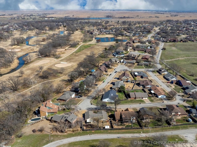 birds eye view of property with a residential view