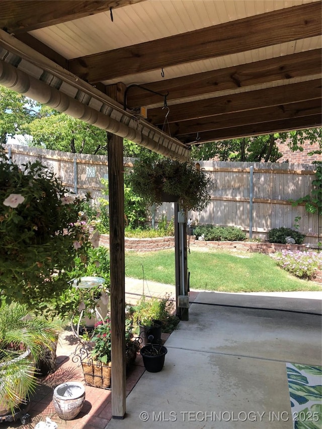 view of patio with fence