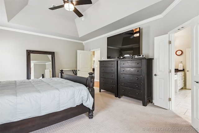 bedroom with a tray ceiling, ornamental molding, light tile patterned floors, light colored carpet, and ceiling fan