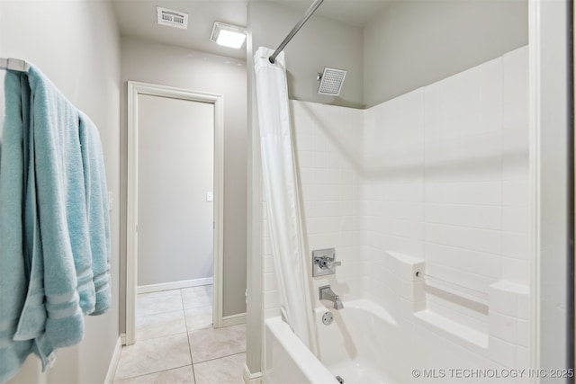 bathroom with tile patterned flooring, shower / bathtub combination with curtain, visible vents, and baseboards