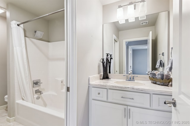 bathroom with toilet, vanity, shower / tub combo with curtain, and visible vents