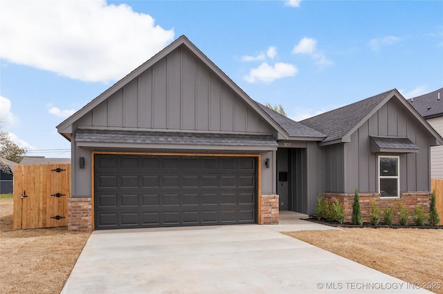 view of front of house featuring concrete driveway, an attached garage, brick siding, and a shingled roof
