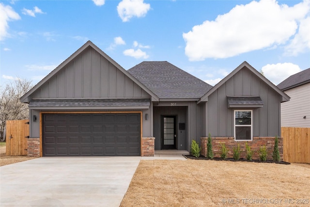 view of front of home with driveway, brick siding, an attached garage, and a shingled roof