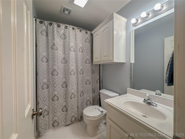 full bathroom with visible vents, a shower with curtain, toilet, tile patterned flooring, and vanity