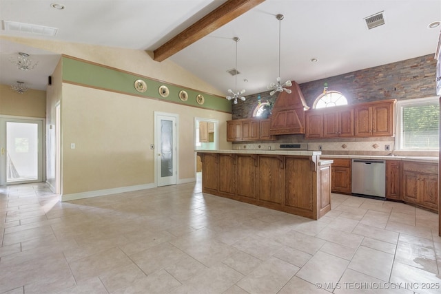 kitchen featuring beam ceiling, visible vents, dishwasher, and a breakfast bar