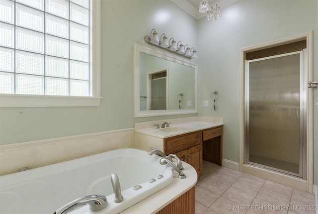 bathroom featuring a shower stall, a garden tub, ornamental molding, tile patterned floors, and vanity