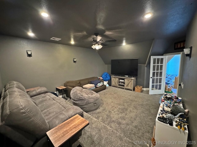 cinema with a ceiling fan, visible vents, carpet floors, lofted ceiling, and recessed lighting
