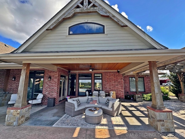 view of patio / terrace with ceiling fan and outdoor lounge area