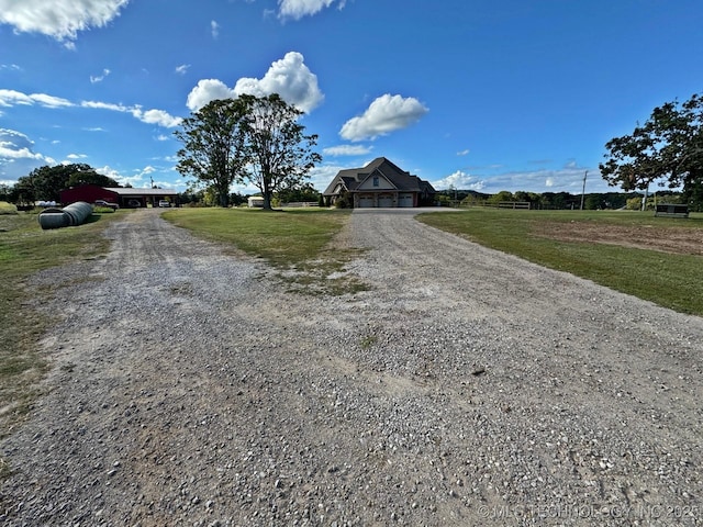 view of road featuring driveway