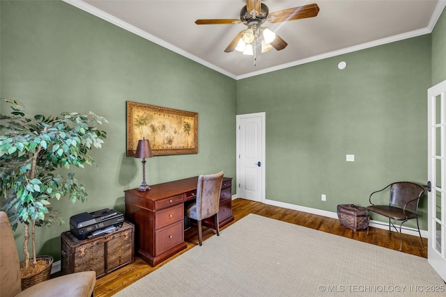 office area with a ceiling fan, baseboards, crown molding, and wood finished floors
