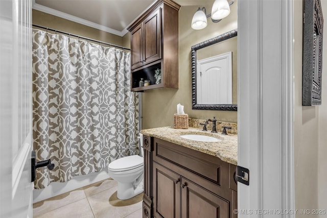 bathroom with toilet, tile patterned flooring, vanity, and ornamental molding