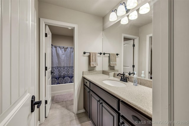 full bathroom featuring vanity and tile patterned floors