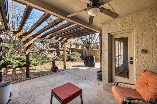view of patio with a pergola, fence, and a ceiling fan