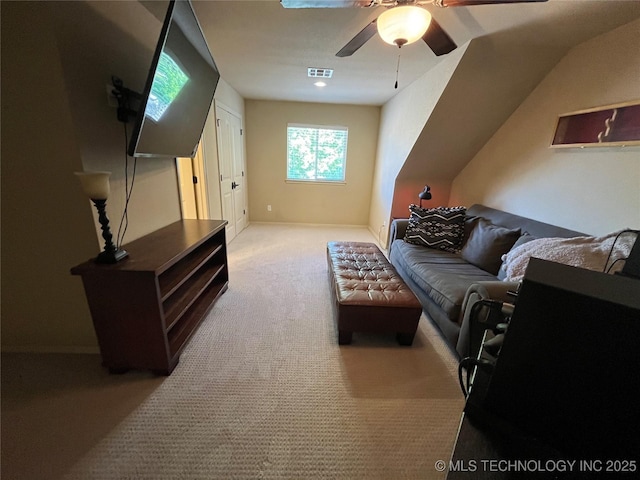 carpeted living area with visible vents and ceiling fan