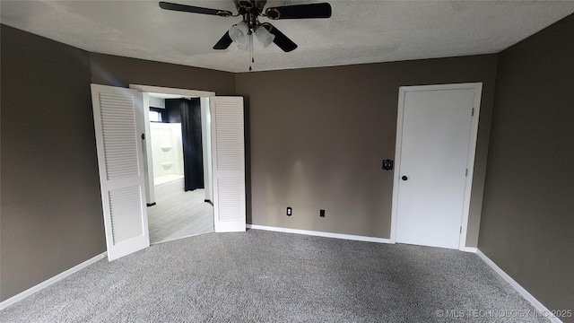 305 E 48th Pl, Sand Springs, OK 74063 - carpeted empty room featuring baseboards, a ceiling fan, and a textured ceiling