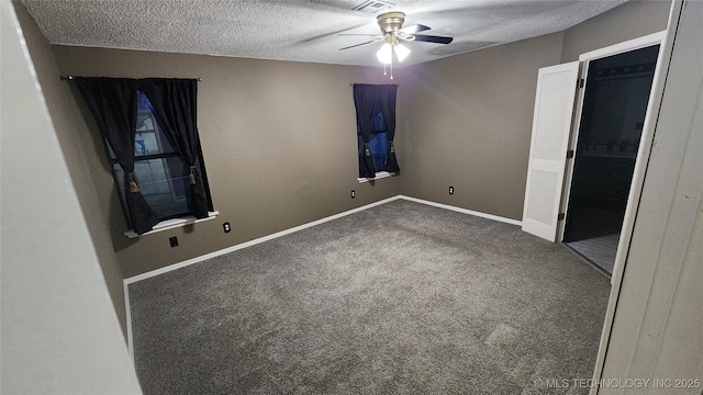 305 E 48th Pl, Sand Springs, OK 74063 - unfurnished bedroom with carpet floors, baseboards, visible vents, and a textured ceiling
