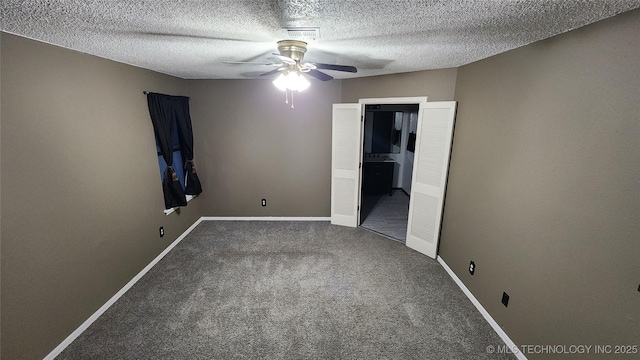 305 E 48th Pl, Sand Springs, OK 74063 - unfurnished bedroom featuring carpet, visible vents, baseboards, and a textured ceiling