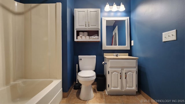 305 E 48th Pl, Sand Springs, OK 74063 - bathroom with tile patterned flooring, vanity, baseboards, and toilet