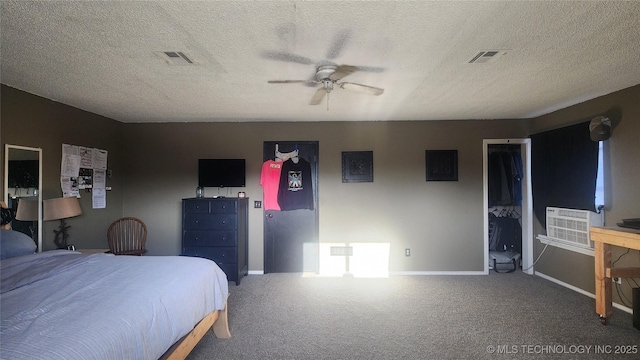 305 E 48th Pl, Sand Springs, OK 74063 - carpeted bedroom with a textured ceiling, baseboards, and visible vents