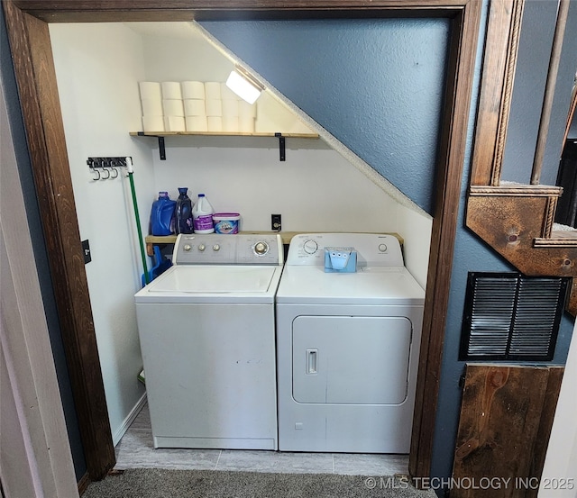 305 E 48th Pl, Sand Springs, OK 74063 - laundry room featuring washing machine and dryer and laundry area