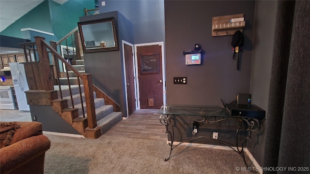 305 E 48th Pl, Sand Springs, OK 74063 - foyer featuring wood finished floors and stairs