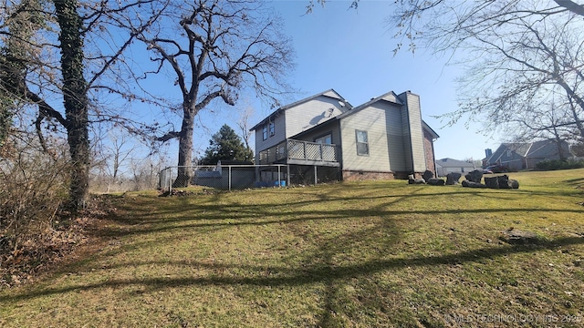305 E 48th Pl, Sand Springs, OK 74063 - exterior space featuring crawl space, fence, a lawn, and a chimney