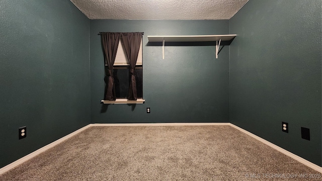 305 E 48th Pl, Sand Springs, OK 74063 - carpeted empty room featuring baseboards and a textured ceiling