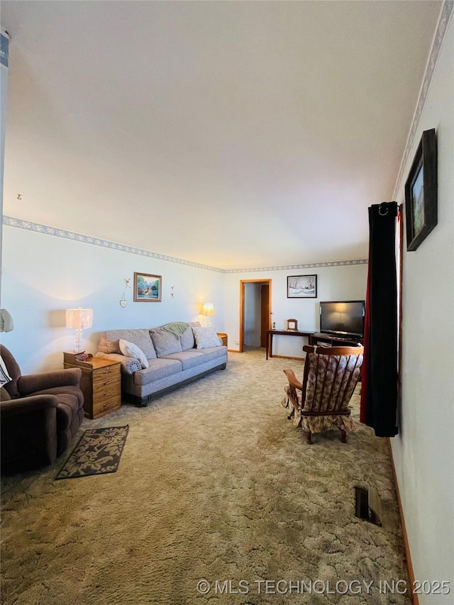 306 N Cherokee St, Beggs, OK 74421 - living area featuring baseboards and carpet floors