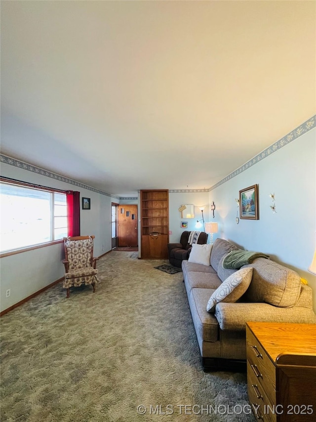 306 N Cherokee St, Beggs, OK 74421 - living room with dark carpet and baseboards