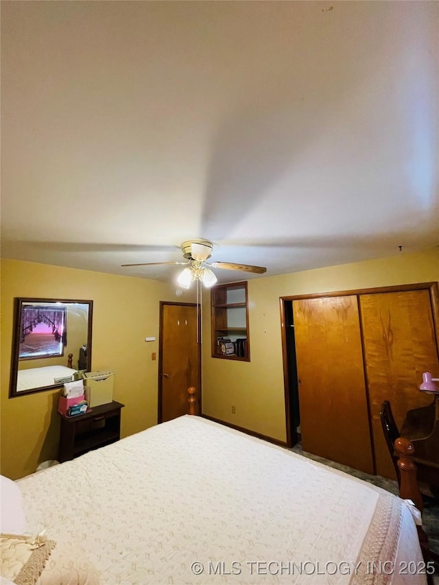 306 N Cherokee St, Beggs, OK 74421 - bedroom featuring a closet and ceiling fan