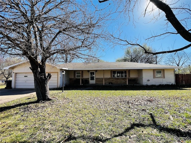 306 N Cherokee St, Beggs, OK 74421 - single story home with a garage, concrete driveway, a front yard, and fence
