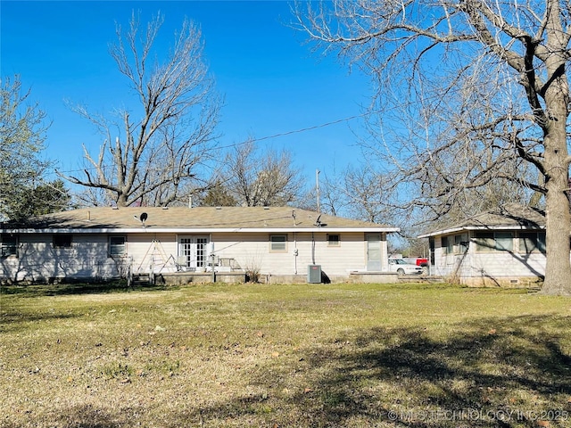 306 N Cherokee St, Beggs, OK 74421 - rear view of house with crawl space and a lawn