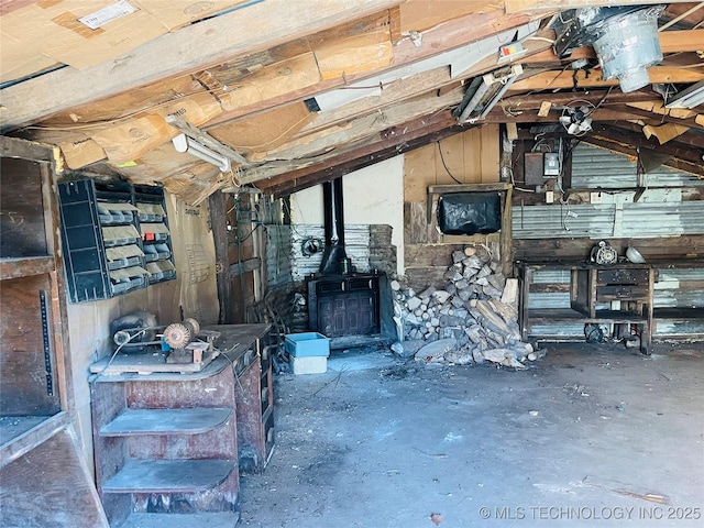 306 N Cherokee St, Beggs, OK 74421 - misc room featuring lofted ceiling and a wood stove
