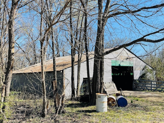 306 N Cherokee St, Beggs, OK 74421 - view of outbuilding with fence