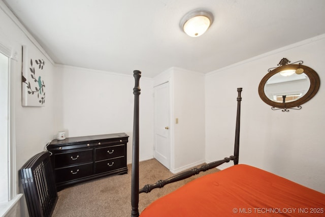 302 W 4th St, Skiatook, OK 74070 - bedroom featuring baseboards, carpet, and ornamental molding