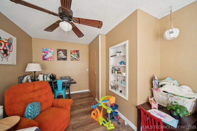 302 W 4th St, Skiatook, OK 74070 - game room featuring built in features, baseboards, wood finished floors, and a ceiling fan