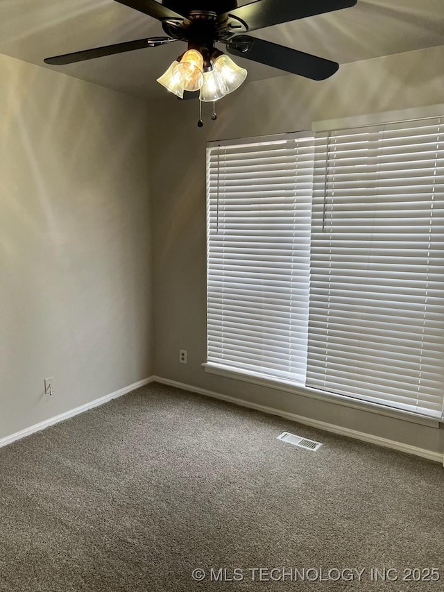 12802 E 31st Ct, Tulsa, OK 74146 - spare room featuring visible vents, carpet flooring, baseboards, and ceiling fan