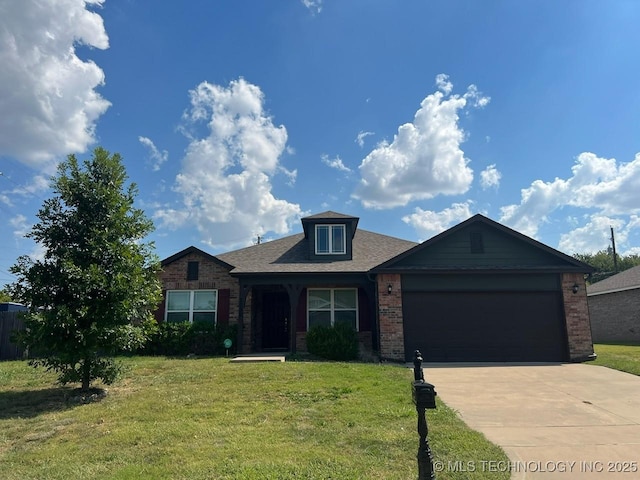 2035 N Kenosha Ct E, Tulsa, OK 74106 - ranch-style home featuring roof with shingles, concrete driveway, a front lawn, a garage, and brick siding