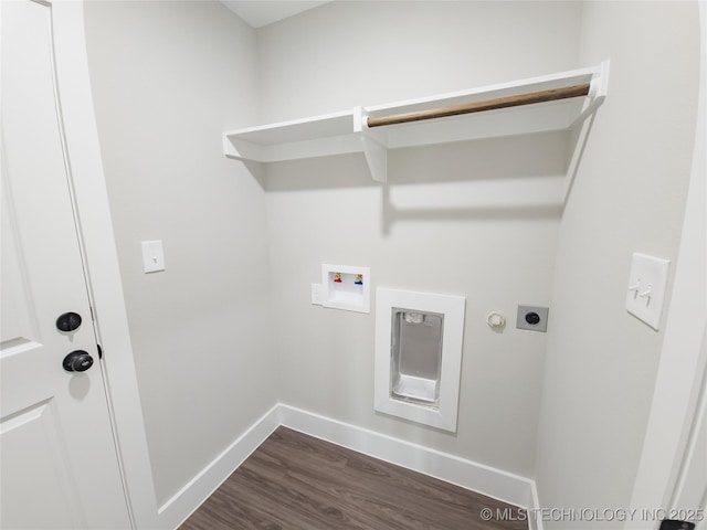 laundry area with hookup for a washing machine, baseboards, dark wood finished floors, laundry area, and electric dryer hookup