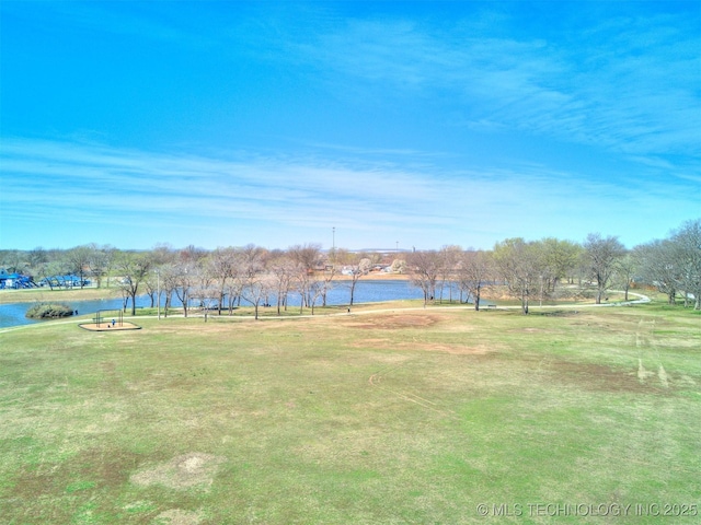 7610 N 127th E Ave, Owasso, OK 74055 - surrounding community featuring a water view and a lawn
