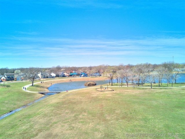 7610 N 127th E Ave, Owasso, OK 74055 - view of community featuring a lawn