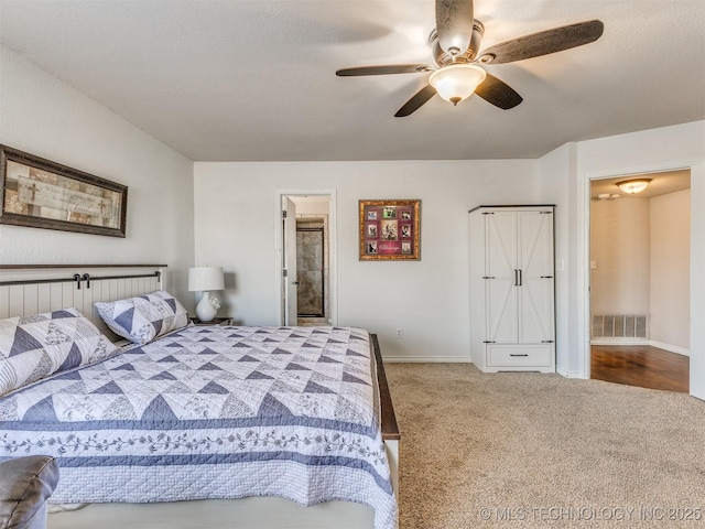 7610 N 127th E Ave, Owasso, OK 74055 - carpeted bedroom featuring baseboards and ceiling fan