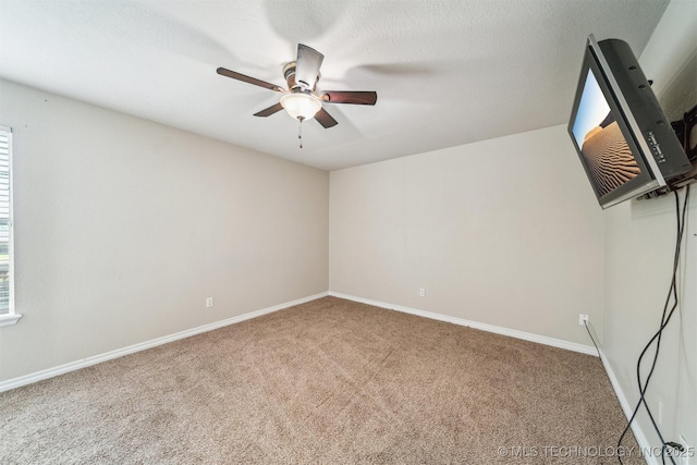 7610 N 127th E Ave, Owasso, OK 74055 - carpeted spare room with ceiling fan and baseboards