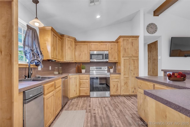 922 Oak Ridge St, Ardmore, OK 73401 - kitchen with stainless steel appliances, a sink, light wood-type flooring, light brown cabinetry, and beam ceiling