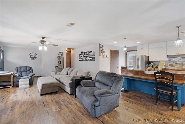 420722 E 1920th Rd, Antlers, OK 74523 - living room featuring visible vents, recessed lighting, ceiling fan, and wood finished floors