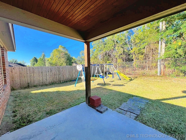 4169 Highland Dr, Tahlequah, OK 74464 - view of yard featuring a playground and a patio