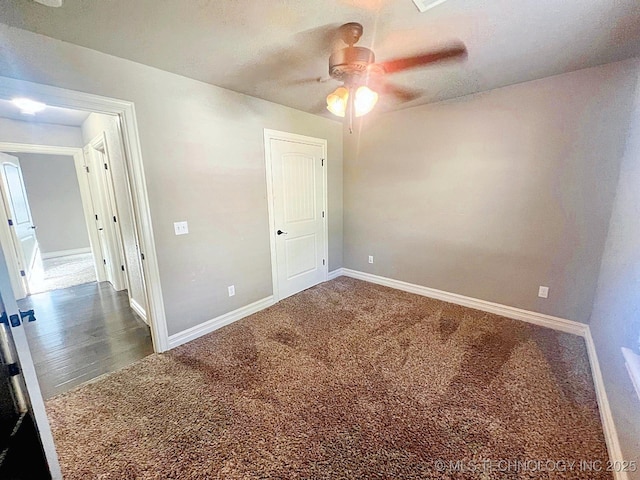 4169 Highland Dr, Tahlequah, OK 74464 - carpeted empty room featuring a ceiling fan and baseboards