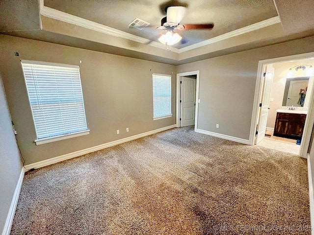 4169 Highland Dr, Tahlequah, OK 74464 - unfurnished bedroom with a raised ceiling, crown molding, carpet floors, and baseboards