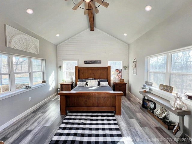 11457 N 510th Rd, Tahlequah, OK 74464 - bedroom featuring multiple windows, wood finished floors, beamed ceiling, baseboards, and high vaulted ceiling