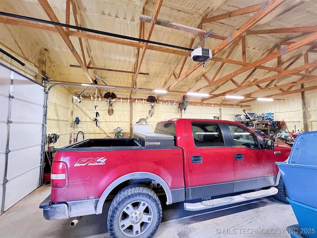 11457 N 510th Rd, Tahlequah, OK 74464 - garage featuring a garage door opener